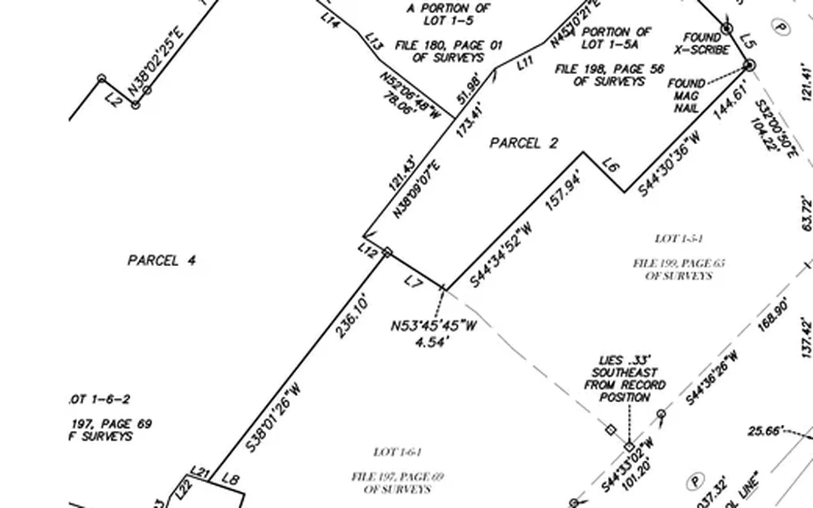 CAD drawing of parcel boundary lines with bearing and distance labels and found-monument markers