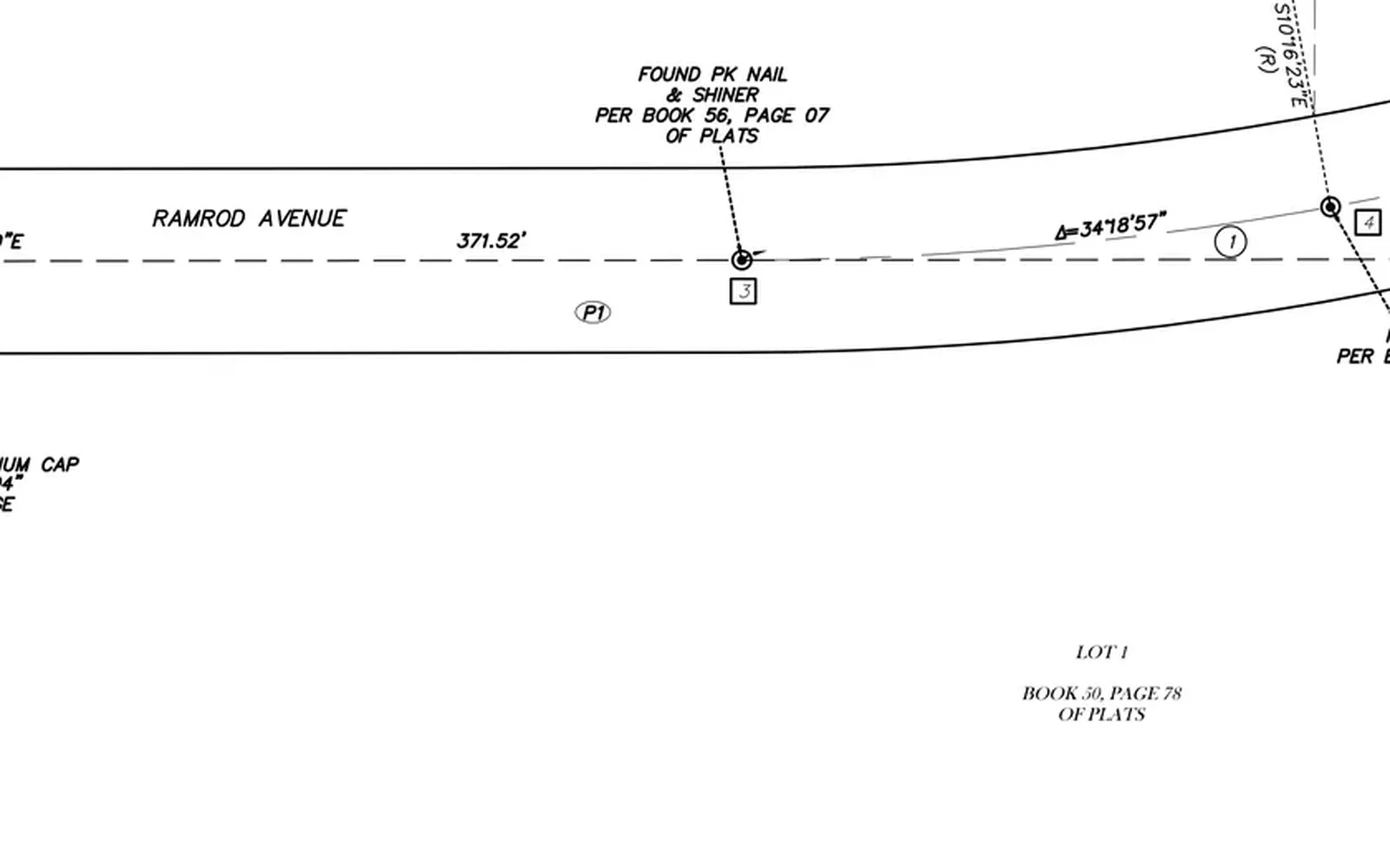 Detail of a CAD mapping drawing showing a roadway centerline, a curve callout, and a found monument